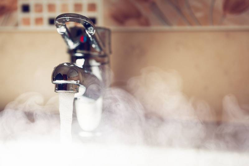 steaming hot water from faucet